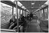 Riders in monorail. Seattle, Washington ( black and white)