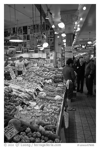 Fruit and vegetable market in Main Arcade, Pike Place Market. Seattle, Washington (black and white)