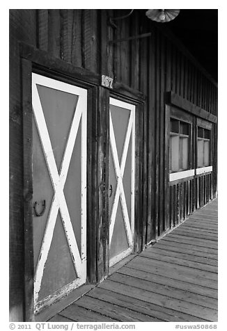 Painted doors and wood building, Winthrop. Washington (black and white)