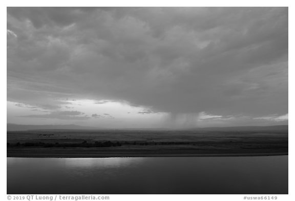 Columbia River and distant rainstorm at sunset, Hanford Reach National Monument. Washington (black and white)