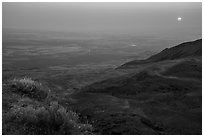 Sun rising in haze over Saddle Mountain, Hanford Reach National Monument. Washington ( black and white)