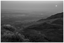 Sun rising in haze over Saddle Mountain, Hanford Reach National Monument. Washington ( black and white)