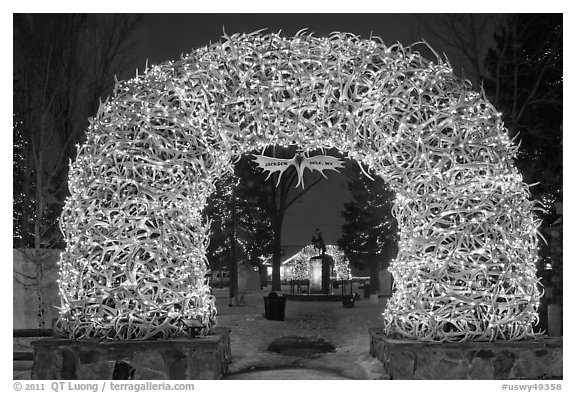 Arch of shed elk antlers at night. Jackson, Wyoming, USA