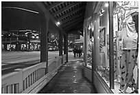 Storefront and gallery by night. Jackson, Wyoming, USA (black and white)