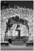 Statue and antler arches by night. Jackson, Wyoming, USA ( black and white)