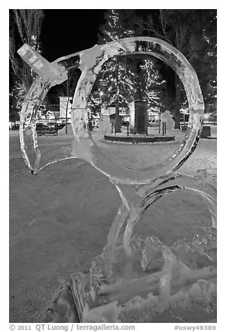 Town square statue framed by ice sculpture. Jackson, Wyoming, USA (black and white)