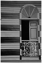 Window with red  shutters and striped walls,  Parc De Bombas, Ponce. Puerto Rico (black and white)