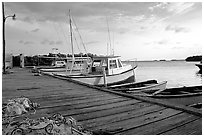 Pier and small boats at sunset, La Parguera. Puerto Rico (black and white)