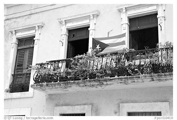 Balcony and flag of Puerto Rico. San Juan, Puerto Rico (black and white)