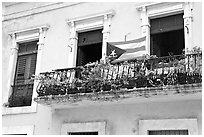 Balcony and flag of Puerto Rico. San Juan, Puerto Rico ( black and white)