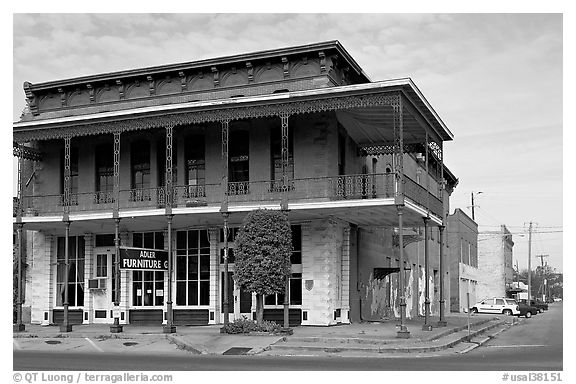 Historic brick building with balcony. Selma, Alabama, USA (black and white)