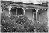 House with crooked porch. Selma, Alabama, USA (black and white)