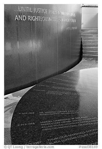 Table with date of Martin Luther King assassination and wall with biblical quote. Montgomery, Alabama, USA (black and white)