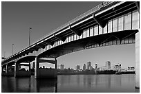 Skyline framed by bridge at sunrise. Little Rock, Arkansas, USA ( black and white)