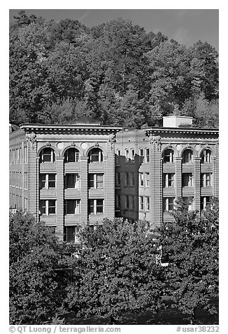 Historic buildings below hillside. Hot Springs, Arkansas, USA (black and white)
