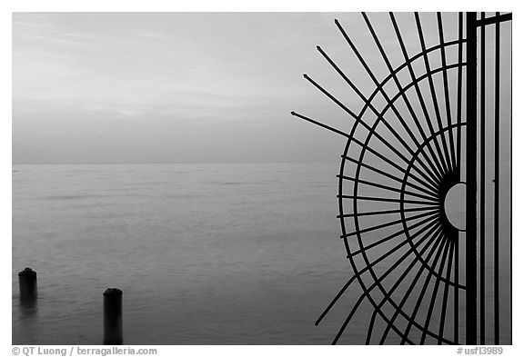 Grid and pilings and sunrise. Key West, Florida, USA