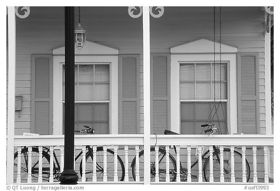 Bicycle on pastel-colored porch. Key West, Florida, USA