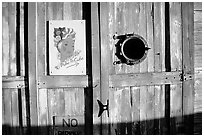 Wooden door with cuba poster. Key West, Florida, USA ( black and white)