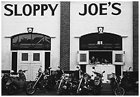 Motorbikes in front of Sloppy Joe. Key West, Florida, USA (black and white)