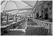 Outdoor restaurant tables, South beach, Miami Beach. Florida, USA ( black and white)