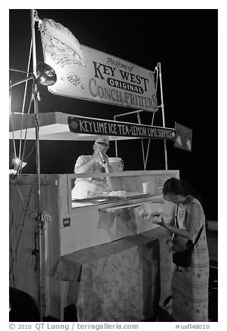 Food stall selling conch fritters on Mallory Square. Key West, Florida, USA (black and white)