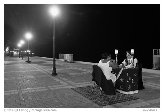 Fortune teller at night, Mallory Square. Key West, Florida, USA (black and white)