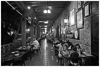 Outdoor dining at Cuban restaurant, Mallory Square. Key West, Florida, USA (black and white)