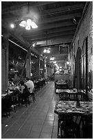 Cuban restaurant at night, Mallory Square. Key West, Florida, USA (black and white)