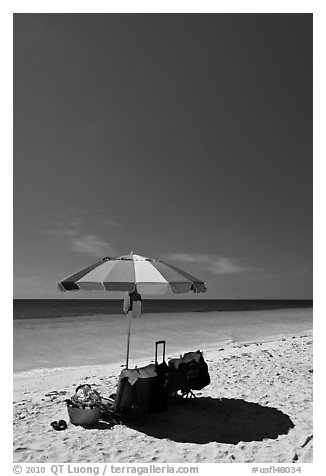 Beach unbrella, blue sky and water, Bahia Honda State Park. The Keys, Florida, USA (black and white)