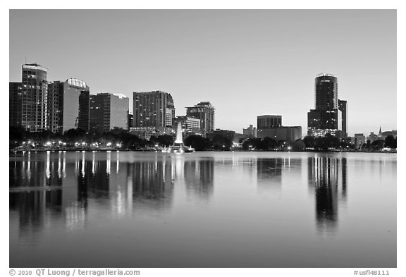 Downtown skyline at sunset, lake Eola. Orlando, Florida, USA (black and white)