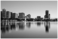 Downtown skyline at sunset, lake Eola. Orlando, Florida, USA (black and white)