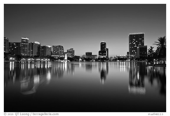 City skyline at dusk from Sumerlin Park. Orlando, Florida, USA (black and white)