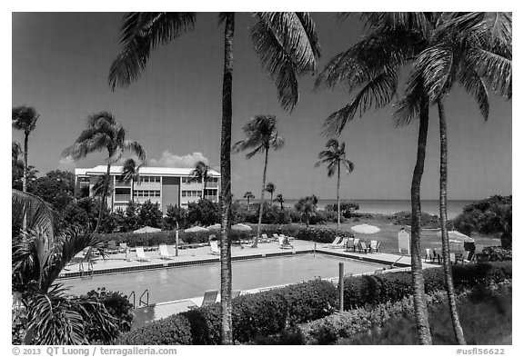 Beachside resort seen through screen, Sanibel Island. Florida, USA