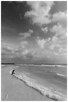 Woman and wave, Fort De Soto beach. Florida, USA (black and white)