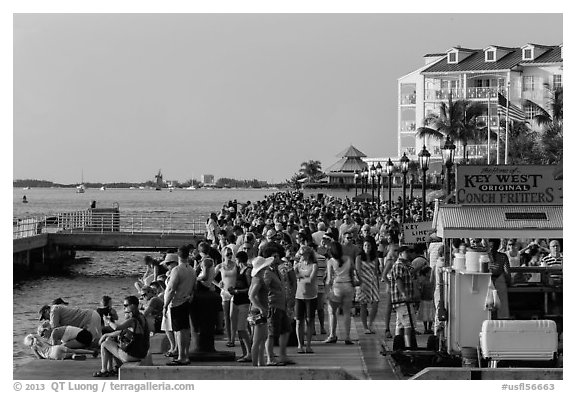 Crowd gathered for sunset in Mallory Square. Key West, Florida, USA (black and white)