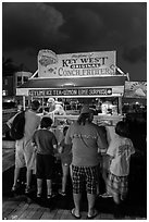 Key lime and conch fritters food stand at night. Key West, Florida, USA ( black and white)