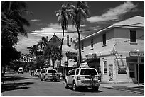 Street with pink cabs. Key West, Florida, USA ( black and white)