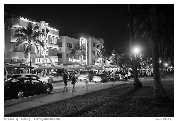 Street with row of Art Deco hotels at night, South Beach District, Miami Beach. Florida, USA (black and white)