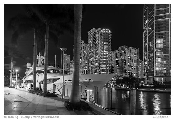 Large yacht, Miami River, and Brickell Key at night, Miami. Florida, USA (black and white)