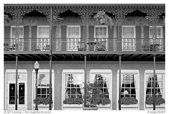 Balcony with wrought-iron decor, Marshall House, Savannah oldest hotel. Savannah, Georgia, USA (black and white)