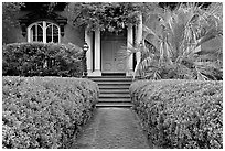 House entrance with garden, historical district. Savannah, Georgia, USA (black and white)