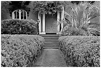 House entrance with garden, historical district. Savannah, Georgia, USA (black and white)