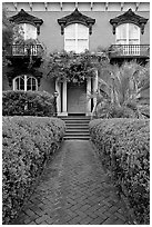 Garden and historic house entrance. Savannah, Georgia, USA (black and white)