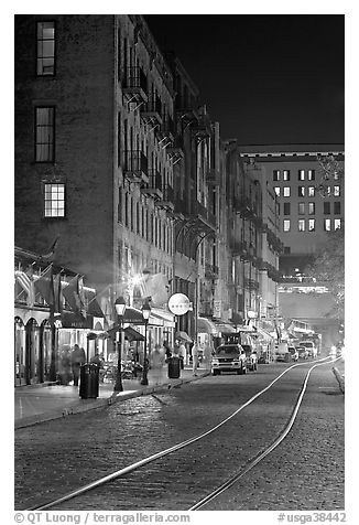 Rails and Cobblestone street by night. Savannah, Georgia, USA