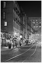 Rails and Cobblestone street by night. Savannah, Georgia, USA (black and white)