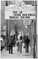 African American people on sidewalk in front of Peackok music store. Atlanta, Georgia, USA ( black and white)