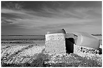 Modules of cotton stored at edge of field. Louisiana, USA (black and white)