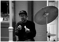 Street musician taking a lunch break, French Quarter. New Orleans, Louisiana, USA (black and white)