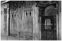 The worned out facade of the Preservation Hall, where some of the best classical jazz can be heard, French Quarter. New Orleans, Louisiana, USA (black and white)