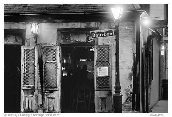 Cafe on Bourbon street at night, French Quarter. New Orleans, Louisiana, USA